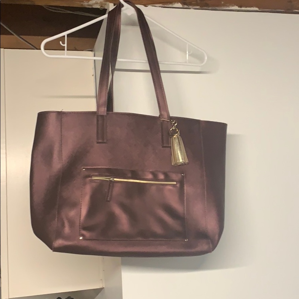 Metallic purple zip bag. Like brand new!